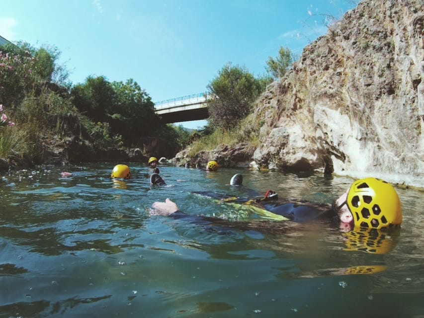 Anna: Guided Canyoning Tour - Natural slides and swimming sections
