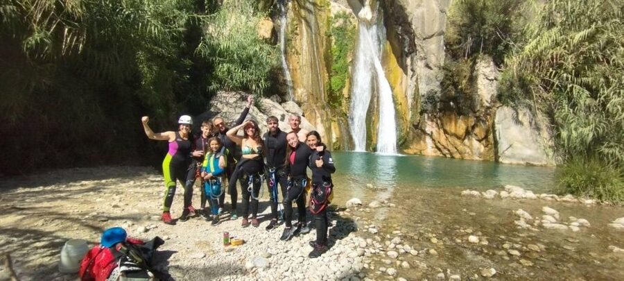 Bolulla: Estret de les Penyes Water Canyoning - Moving through the narrow rock corridor
