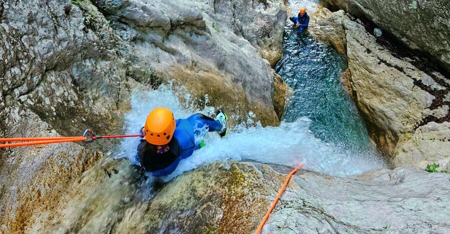 Bovec: Canyoning for Beginners Experience - Entering the canyon with small jumps and slides