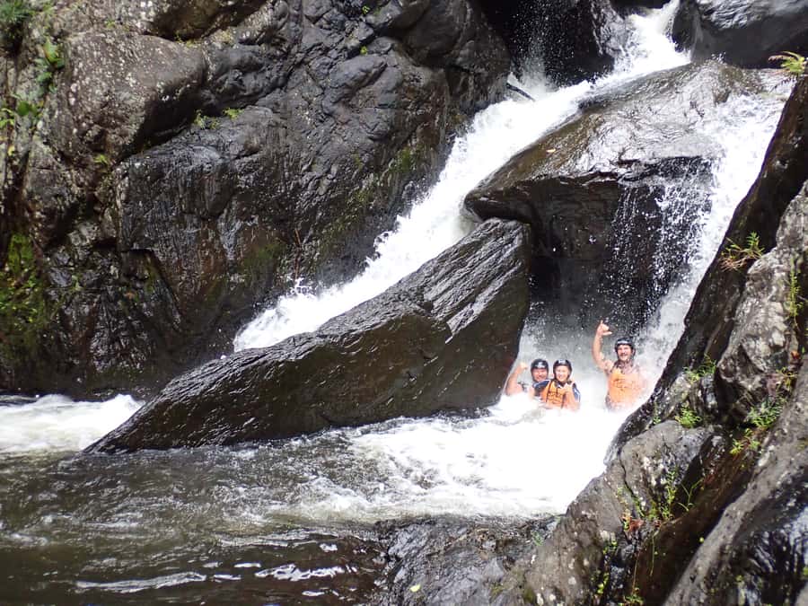 Cairns Full-Day Canyoning Adventure tour - Behana Gorge and the force of Clamshell Falls