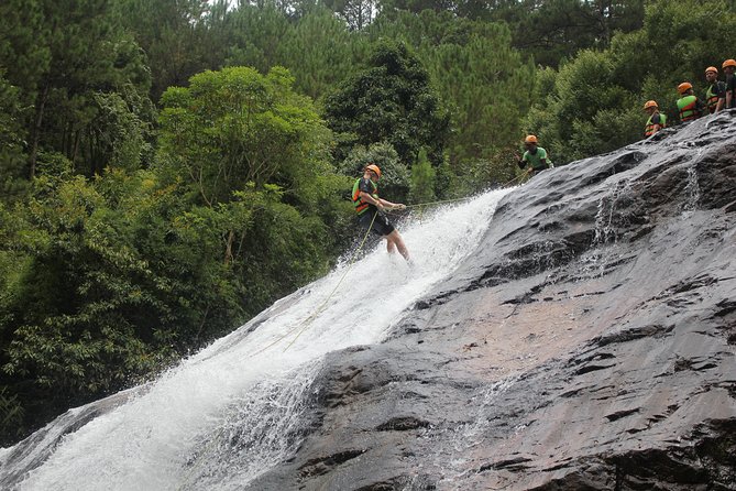 Canyoning Da Lat Vietnam - Water sliding through the canyon