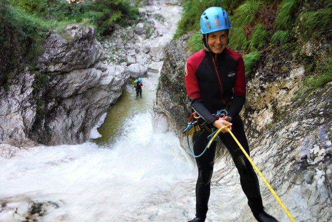 Canyoning In The Triglav National Park - The 50-meter rappel beside Parabola waterfall