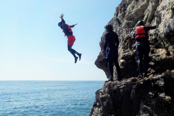 Coasteering and Cliff Jumping Near Lagos - Swimming through caves and along the open coast