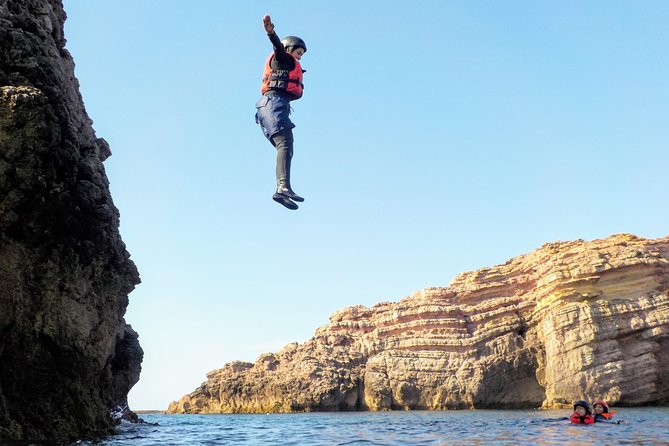 Coasteering and Cliff Jumping Near Lagos - Getting fitted with a wetsuit, helmet, and buoyancy aid