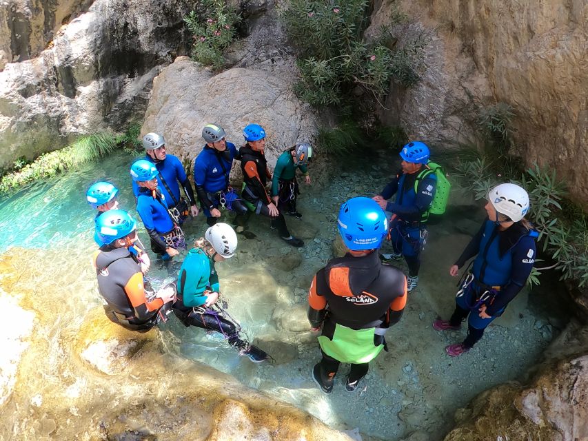 From Granada: Rio Verde Canyoning Tour with Lunch - Three hours of slides, jumps, and waterfalls