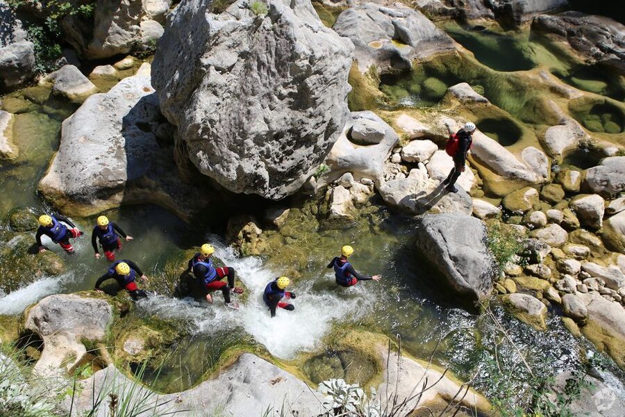 From Split: Canyoning on the Cetina River - Entering the cold, clear Cetina River