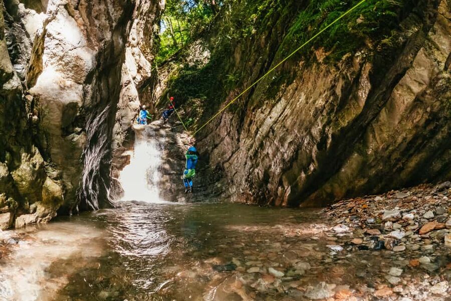 From Tignale, Lake Garda: Beginner-Friendly Canyoning Tour - Getting suited up in neoprene and safety gear