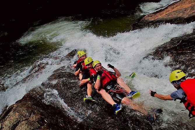 Full Day Canyoning Activity in Da Lat with Lunch - Crossing the waterfall on the Tyrolean traverse