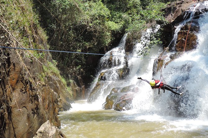 Full-Day Canyoning Tour with Datanla Falls Rappelling - Crossing above the waterfall on the Tyrolean Traverse