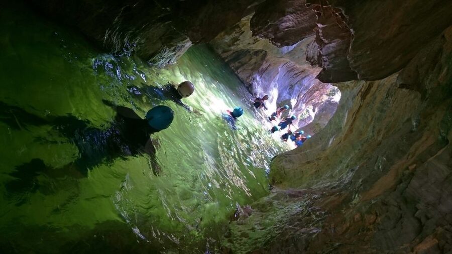 Marbella: Beginner Canyoning Tour with Safety Equipment - Following the river through the rocky canyon