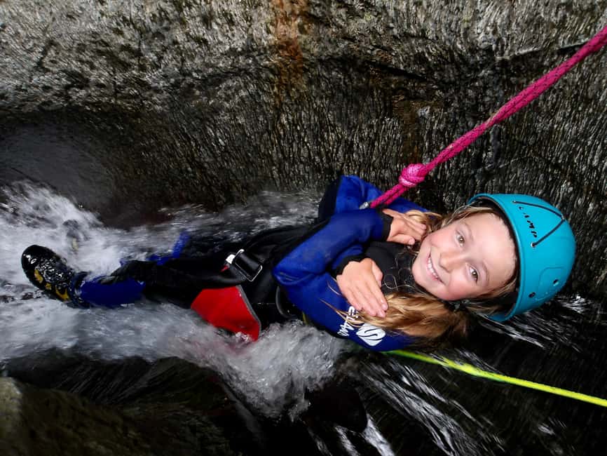 Queenstown: Gibbston Valley Half-Day Canyoning Adventure - Sliding, swimming, and waterfall abseiling
