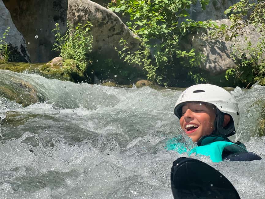 Small Group Canyoning with proffesional guide - Three hours of swims, rapids, and optional jumps