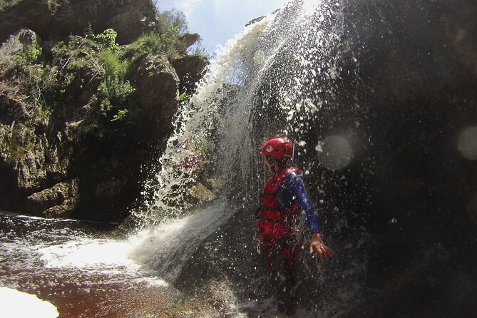 Standard Canyoning Trip in The Crags, South Africa - Rappelling down the 25-meter waterfall